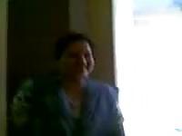 Shy Indian MILF shows her tits for the cam